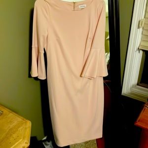 Light pink Calvin Klein, winged sleeved dress.